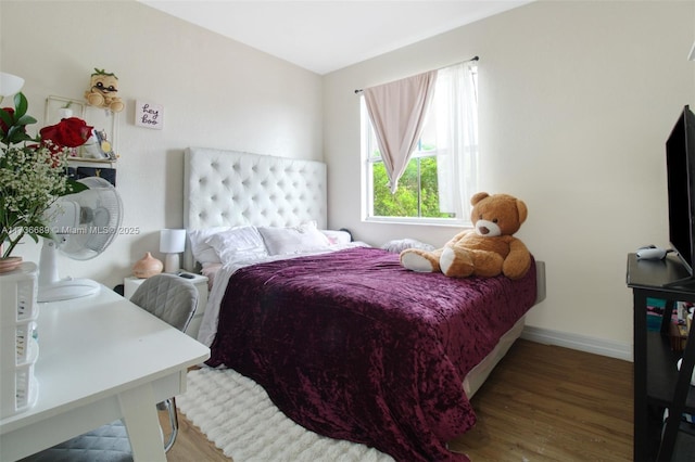 bedroom with wood-type flooring