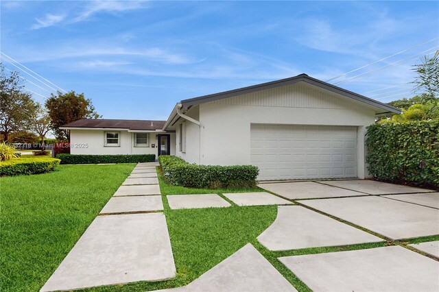 single story home with a front yard