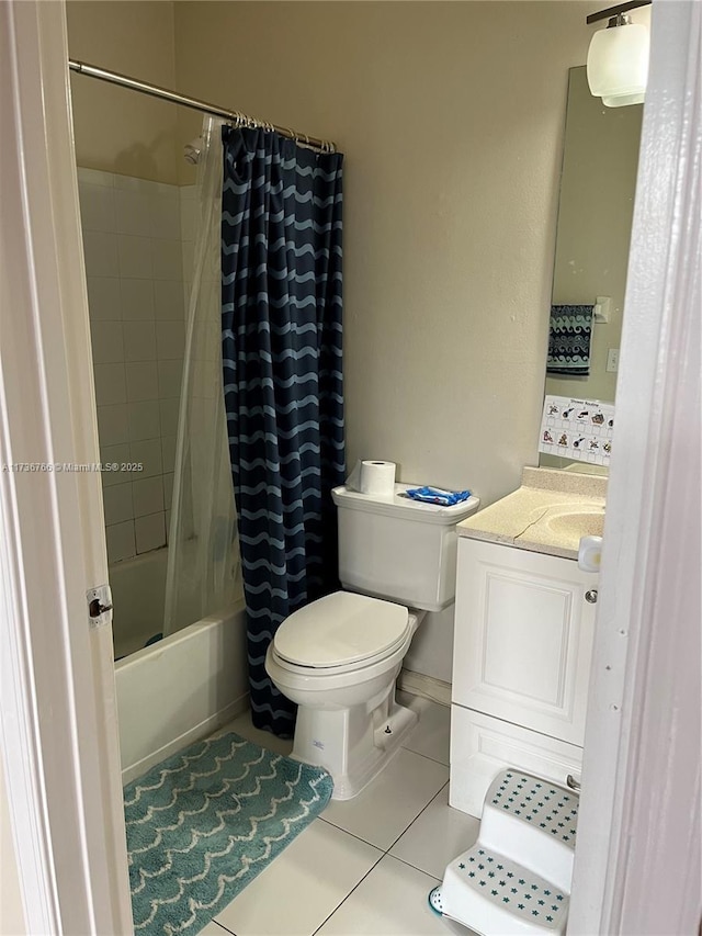 full bathroom with tile patterned flooring, vanity, toilet, and shower / bath combo with shower curtain