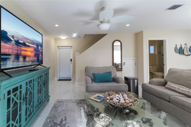 living room featuring ceiling fan