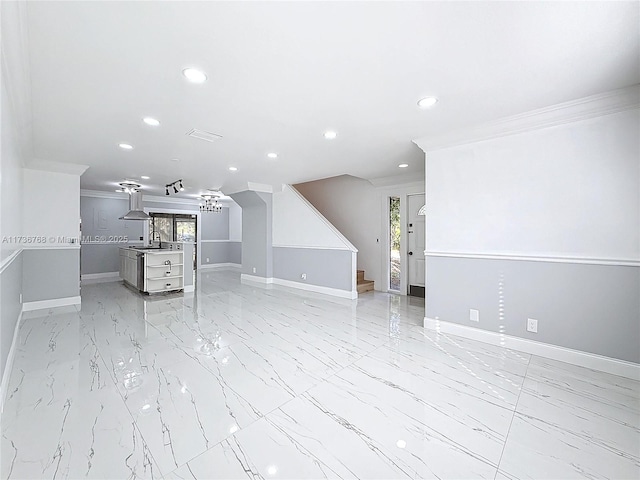 spare room featuring ornamental molding