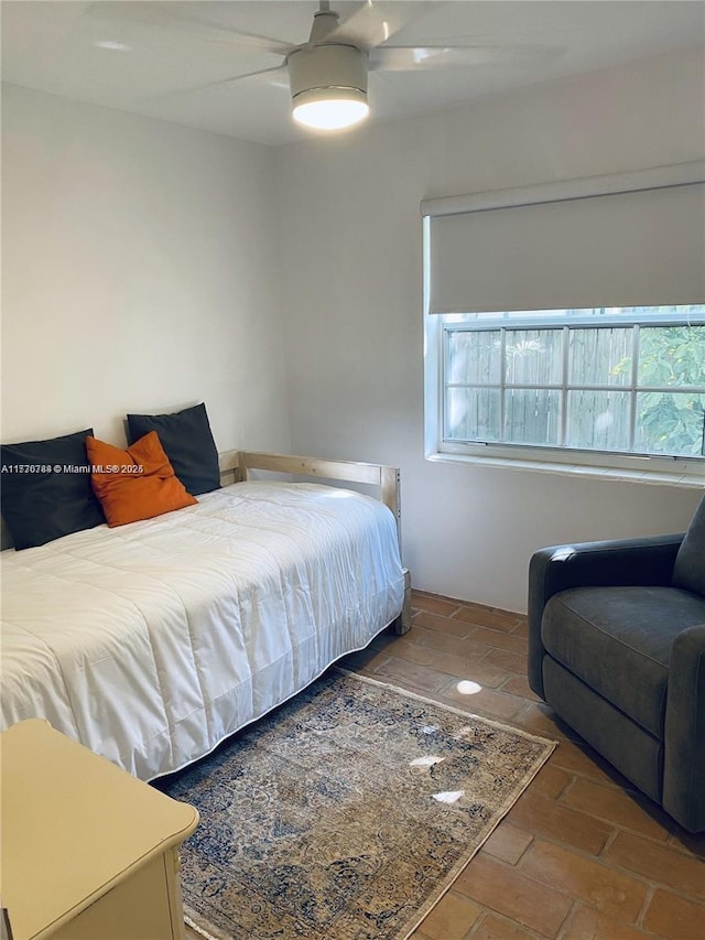 bedroom featuring ceiling fan