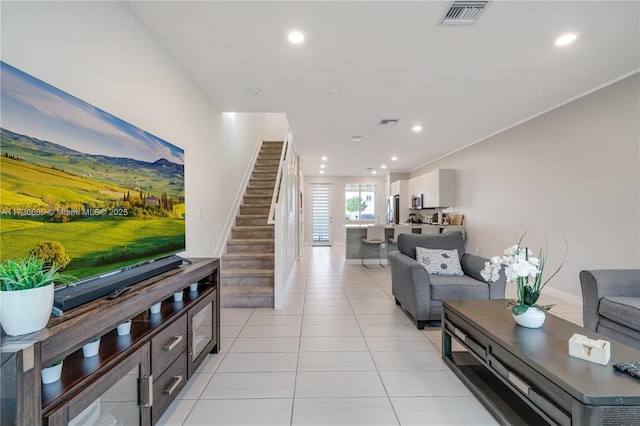 living room featuring light tile patterned floors