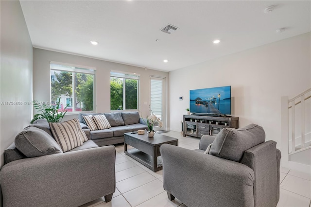 living room featuring light tile patterned floors