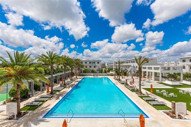 view of swimming pool featuring a patio area