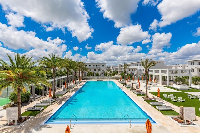 view of swimming pool featuring a patio area