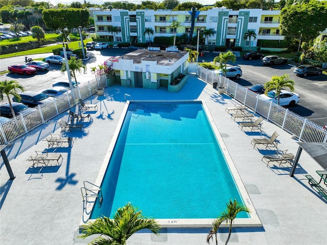 view of swimming pool featuring a patio area