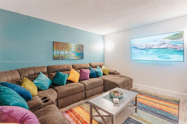 living room with a textured ceiling