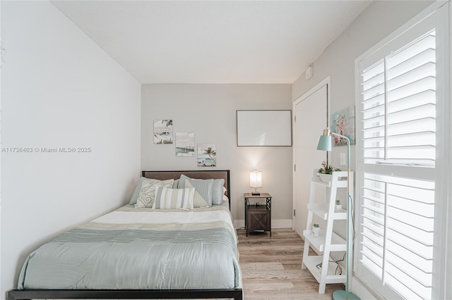 bedroom featuring light hardwood / wood-style floors