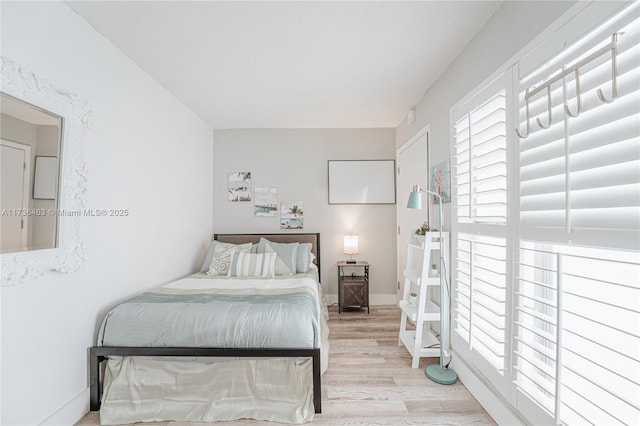 bedroom featuring light wood-type flooring