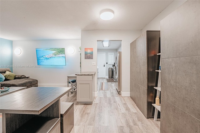 hall featuring light hardwood / wood-style flooring