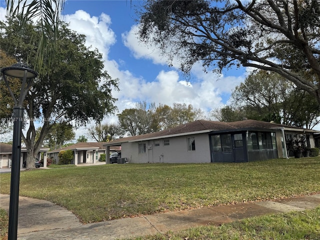 single story home with a front yard