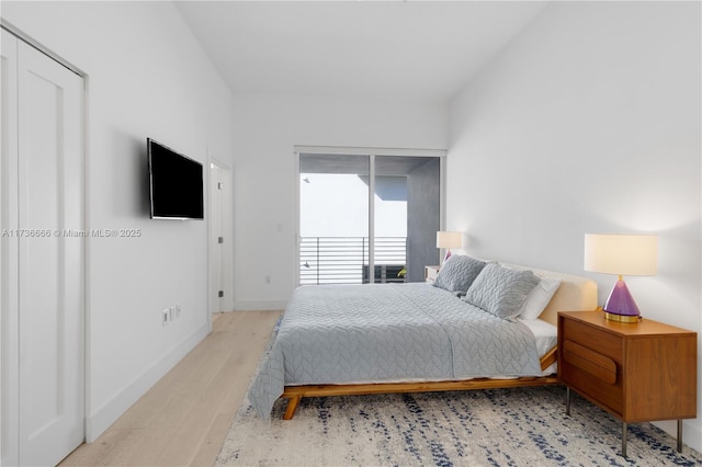 bedroom with light hardwood / wood-style floors