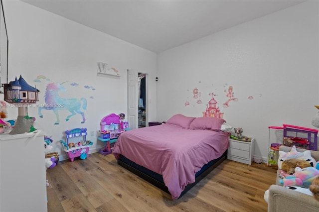 bedroom featuring hardwood / wood-style flooring