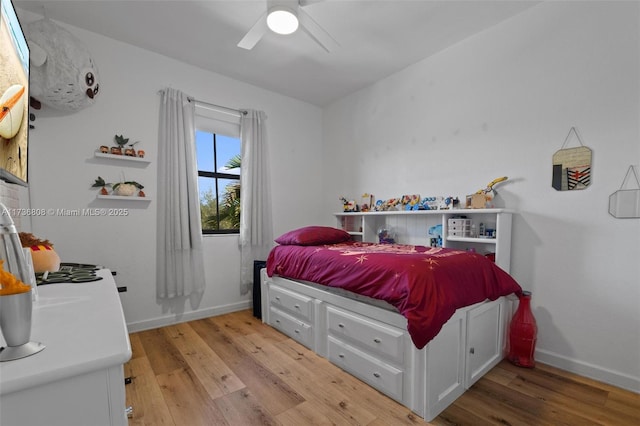 bedroom featuring ceiling fan and light hardwood / wood-style flooring