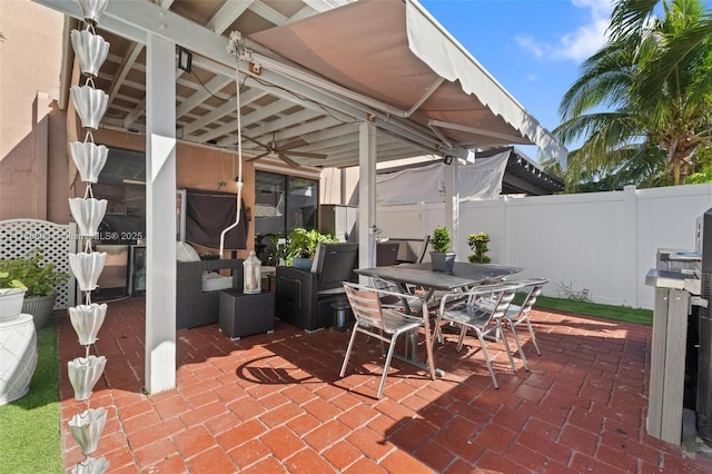 view of patio / terrace featuring ceiling fan