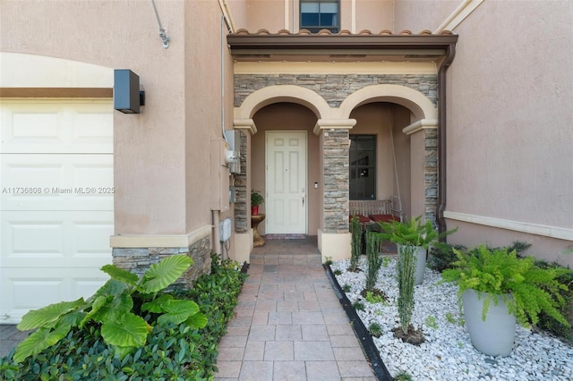 entrance to property with a garage