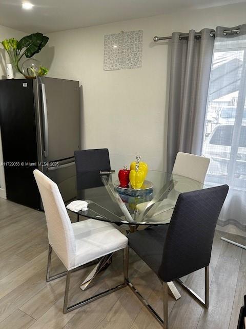 dining room featuring light hardwood / wood-style flooring