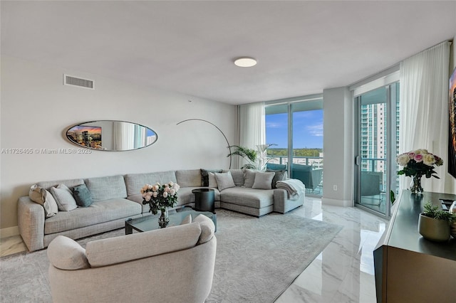 living room with a wall of windows