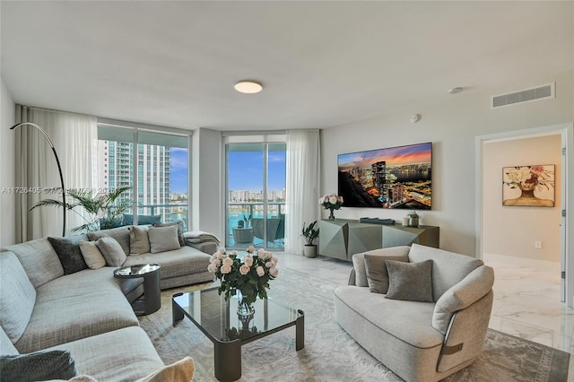 living room featuring expansive windows