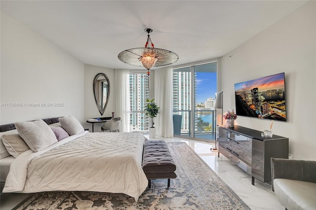 bedroom with a wall of windows