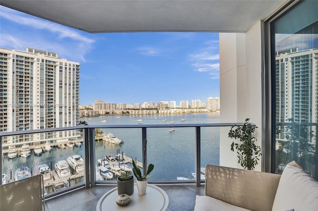 balcony featuring a water view