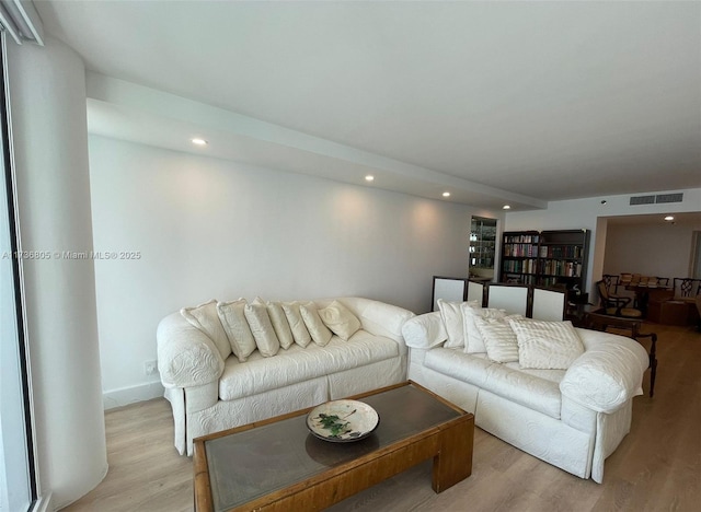 living room featuring light wood-type flooring