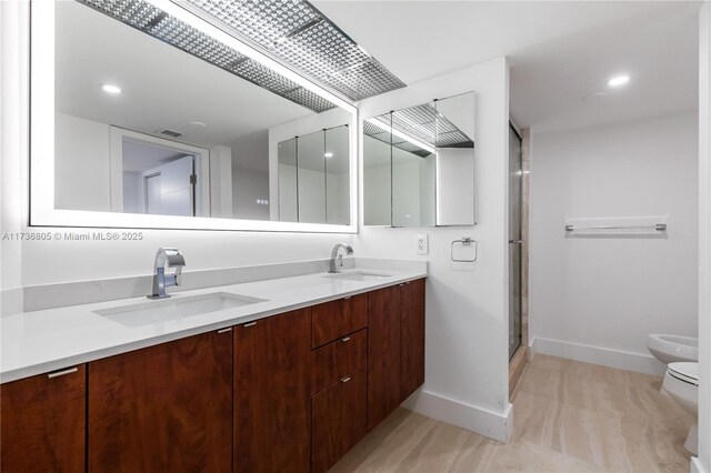 1717 N Bayshore Dr Unit A-1231, Miami, FL 33132 - full bathroom featuring double vanity, a shower stall, a bidet, and recessed lighting
