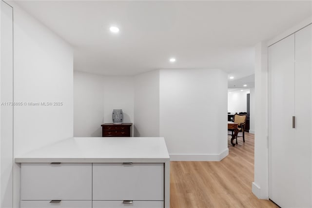 1717 N Bayshore Dr Unit A-1231, Miami, FL 33132 - hall featuring light wood-style floors, a desk, and recessed lighting