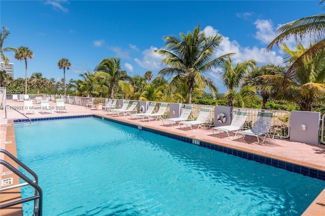 view of pool featuring a patio area