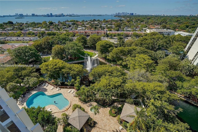 birds eye view of property with a water view