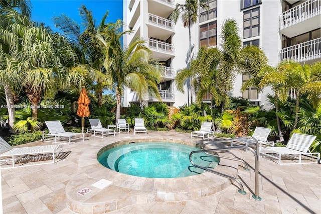 view of pool featuring a patio