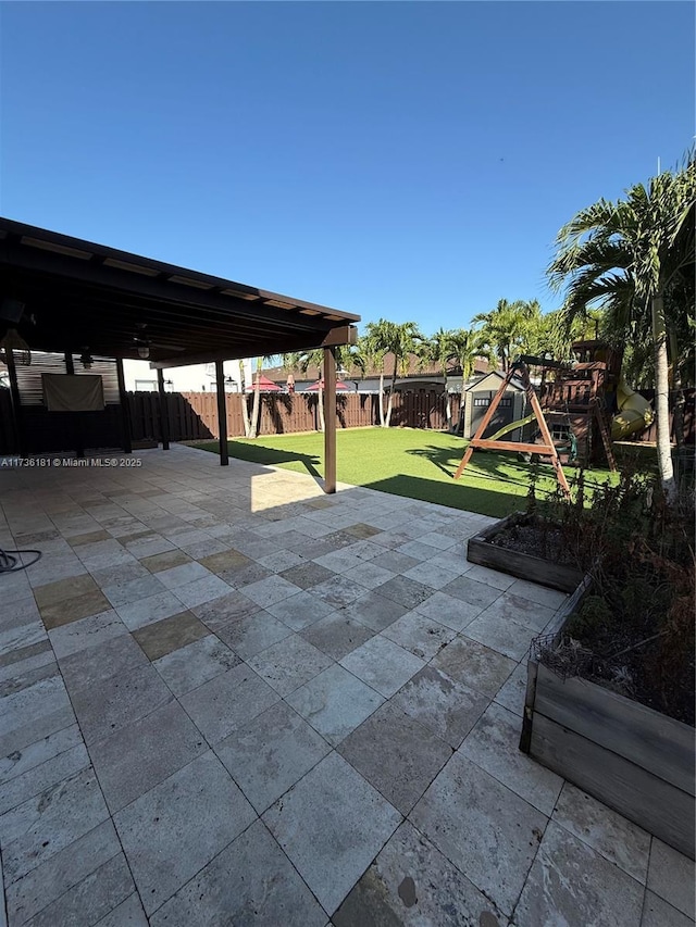 view of patio with a playground