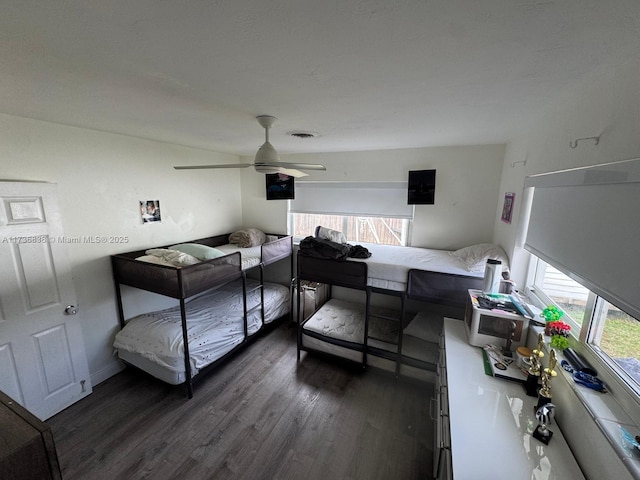 bedroom featuring dark hardwood / wood-style floors and ceiling fan