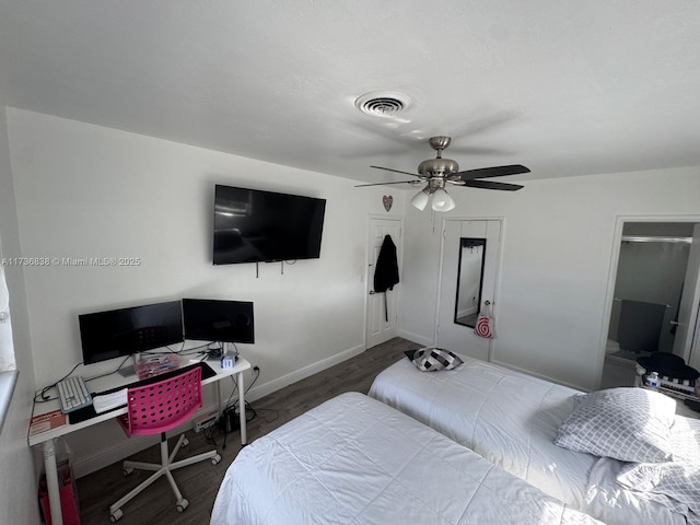 bedroom featuring hardwood / wood-style flooring and ceiling fan