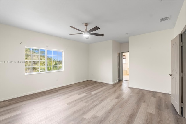 unfurnished room featuring ceiling fan and light hardwood / wood-style flooring