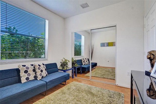 living room with wood-type flooring