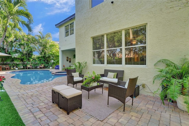 view of pool featuring an outdoor hangout area and a patio area