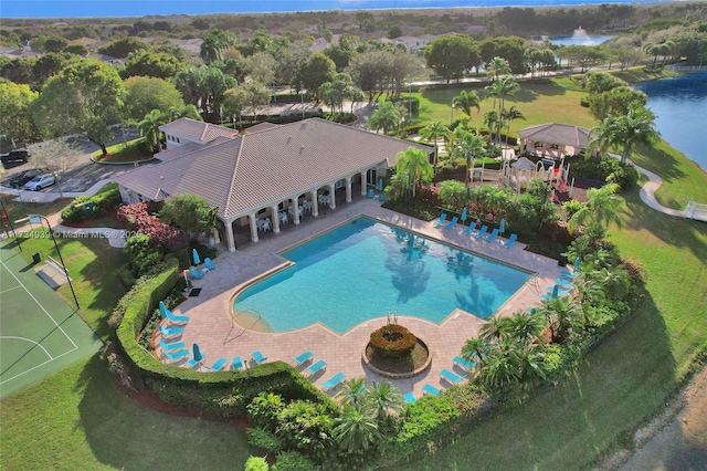 birds eye view of property featuring a water view