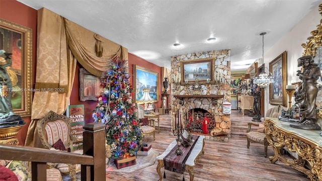 interior space with hardwood / wood-style floors and a fireplace