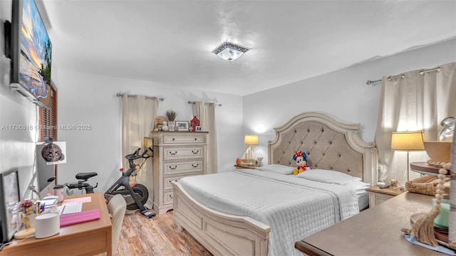 bedroom featuring light hardwood / wood-style flooring