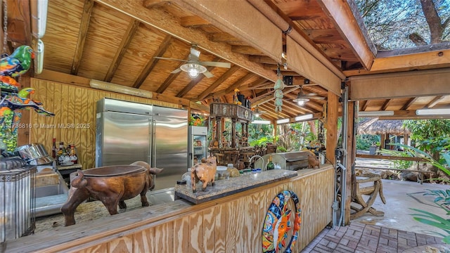 exterior space featuring ceiling fan and built in fridge