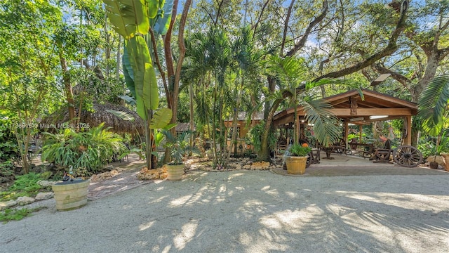 surrounding community with a gazebo and a patio