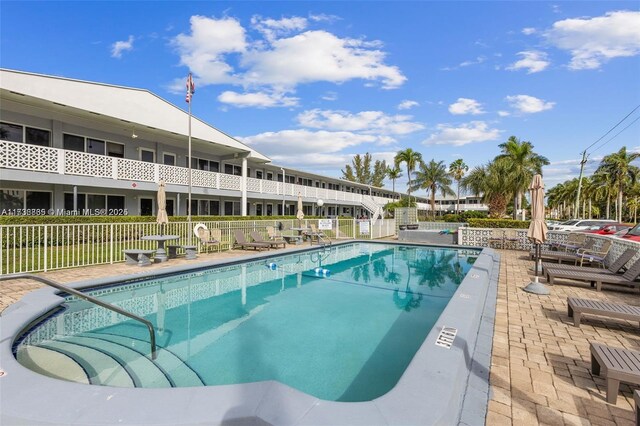 view of pool featuring a patio area