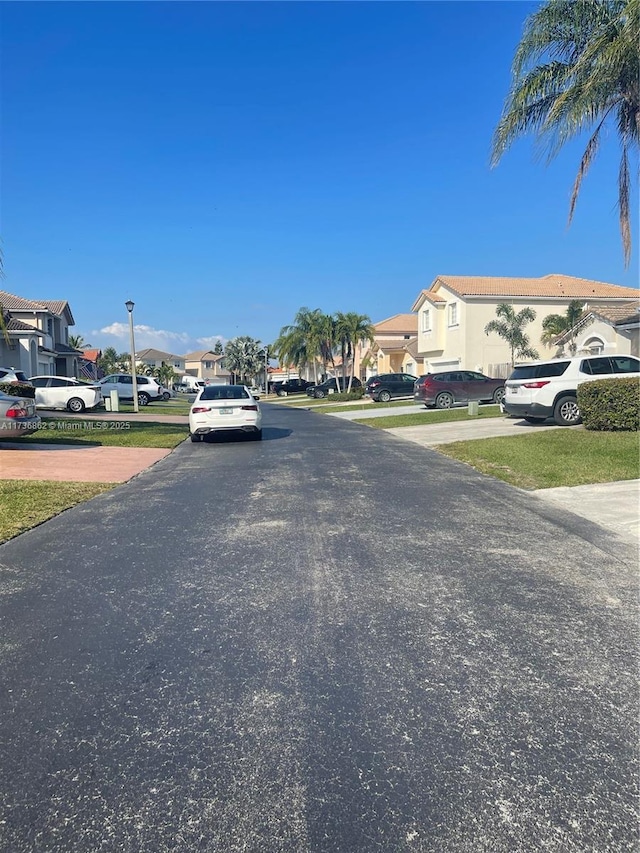 view of road with street lighting and a residential view