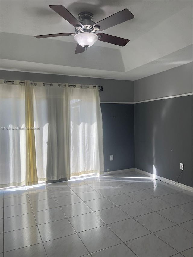 spare room with light tile patterned floors