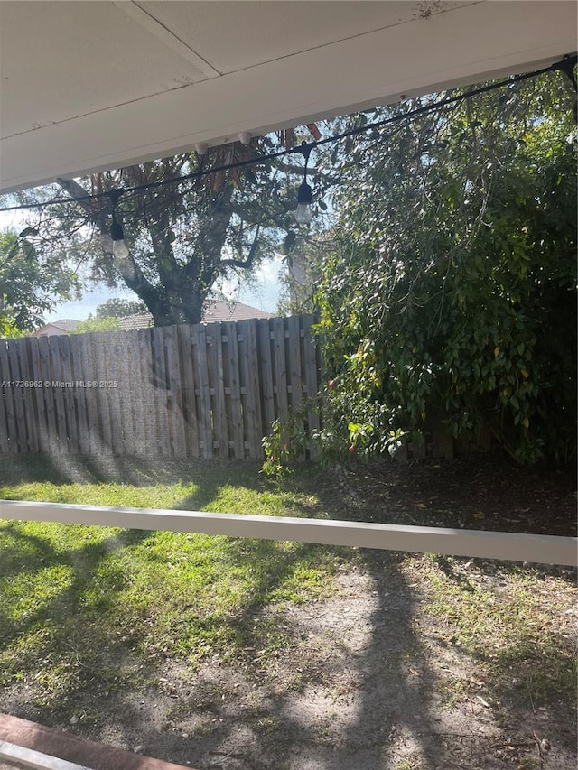 view of yard with fence