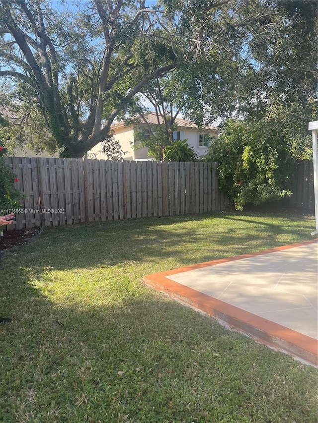 view of yard with fence