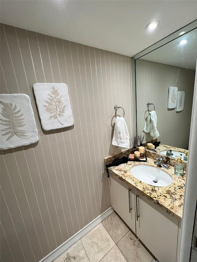 bathroom with vanity and tile patterned flooring