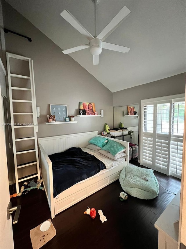 bedroom featuring lofted ceiling, hardwood / wood-style flooring, and ceiling fan